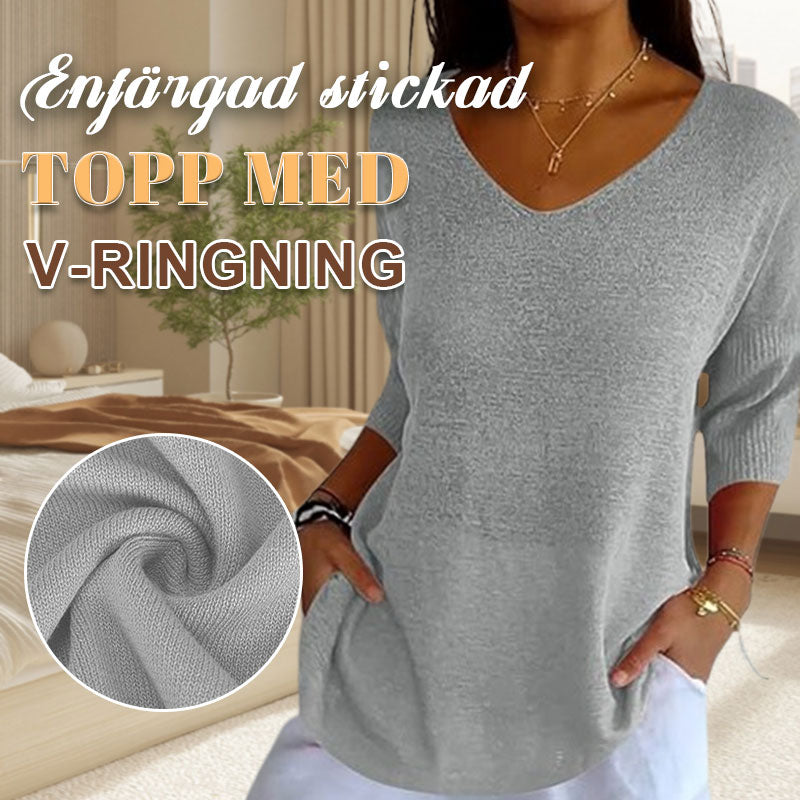 Single coloured knitted top with v-neck