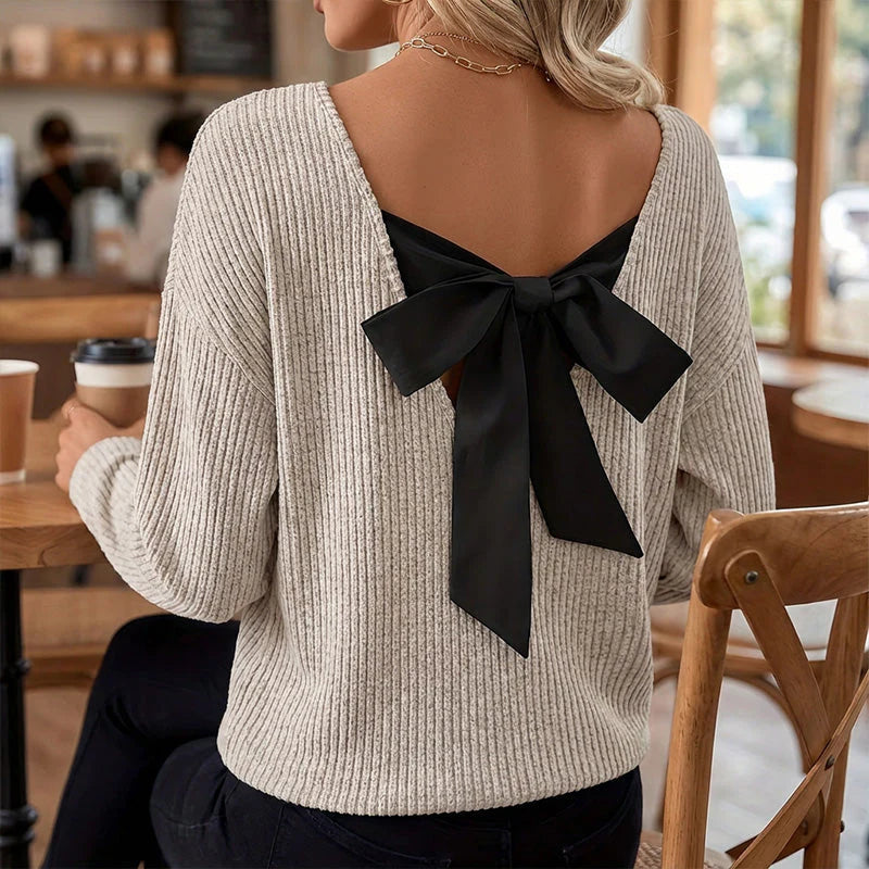 Women's V-neck sweater with elegant back bow