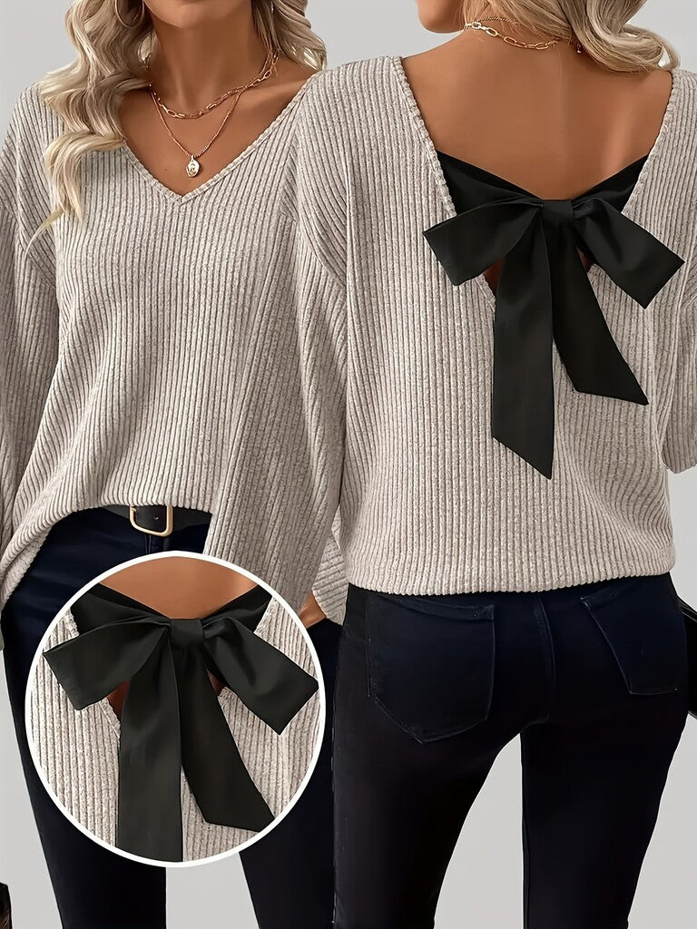 Women's V-neck sweater with elegant back bow