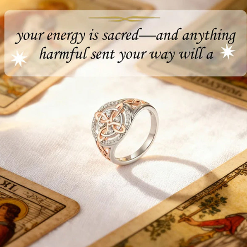 Elegant two-tone ring with Celtic knot and zirconia