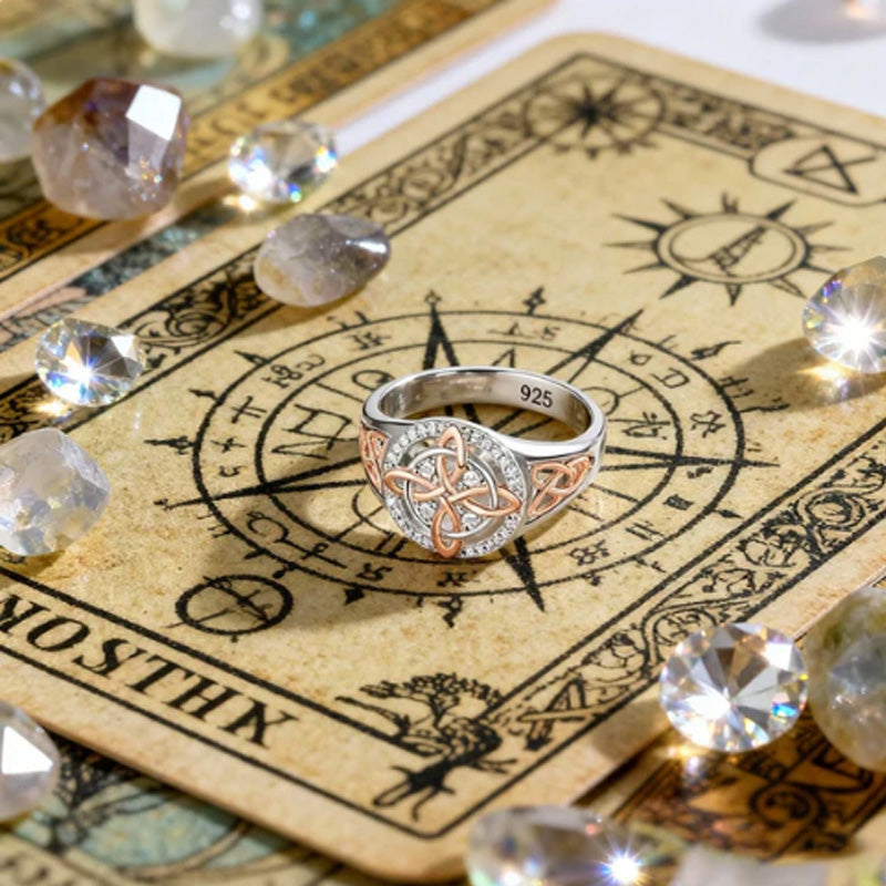 Elegant two-tone ring with Celtic knot and zirconia