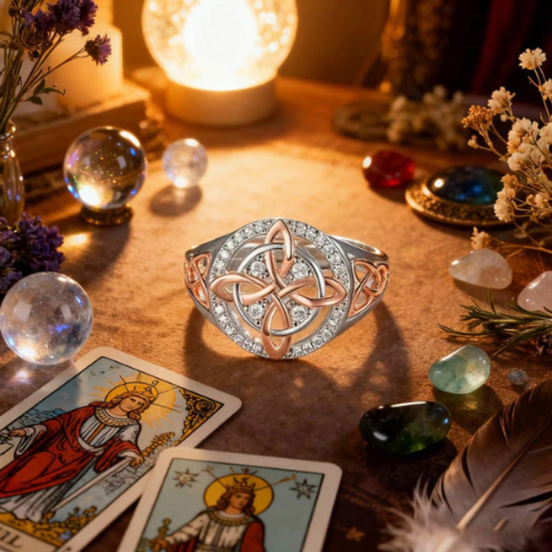 Elegant two-tone ring with Celtic knot and zirconia